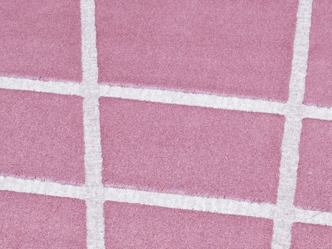 Tappeto rotondo rosa con linee bianche Vivienne di Besana Moquette